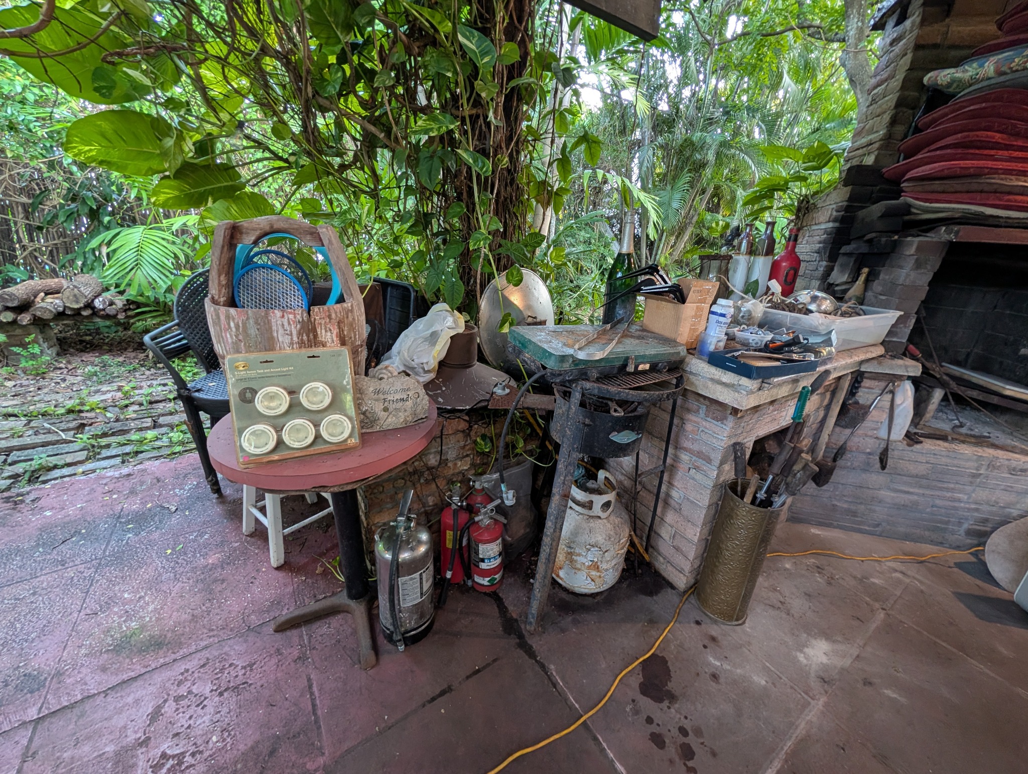 Outdoor area with kitchenware and assorted household items