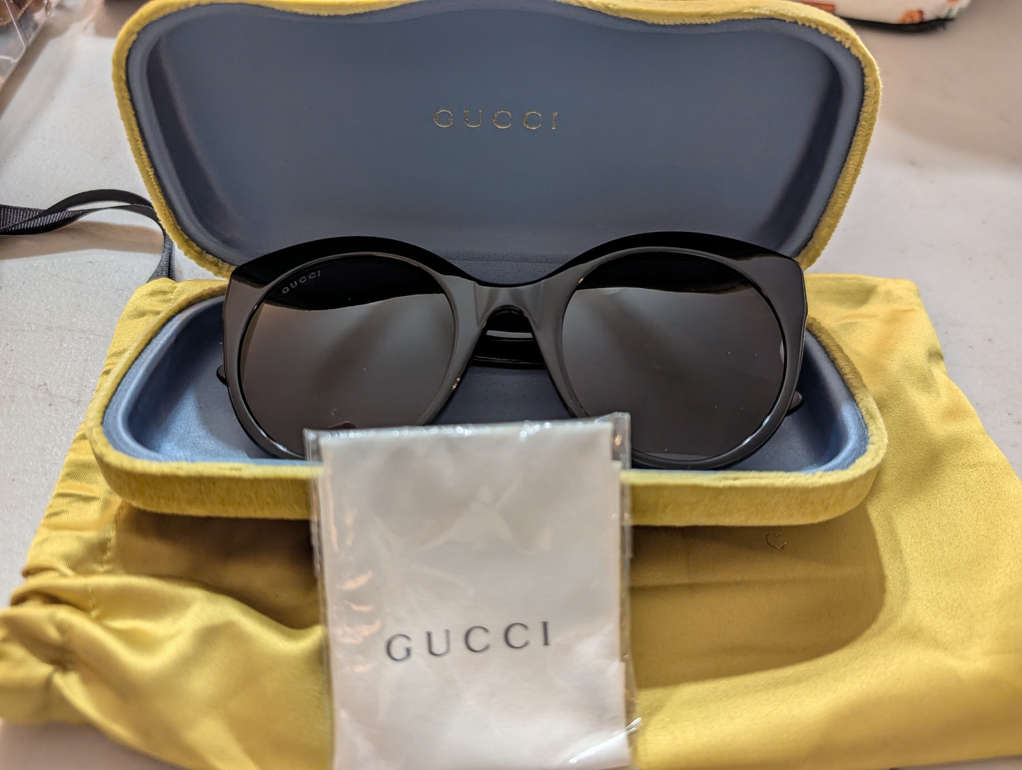 Sunglasses with a Gucci-branded case