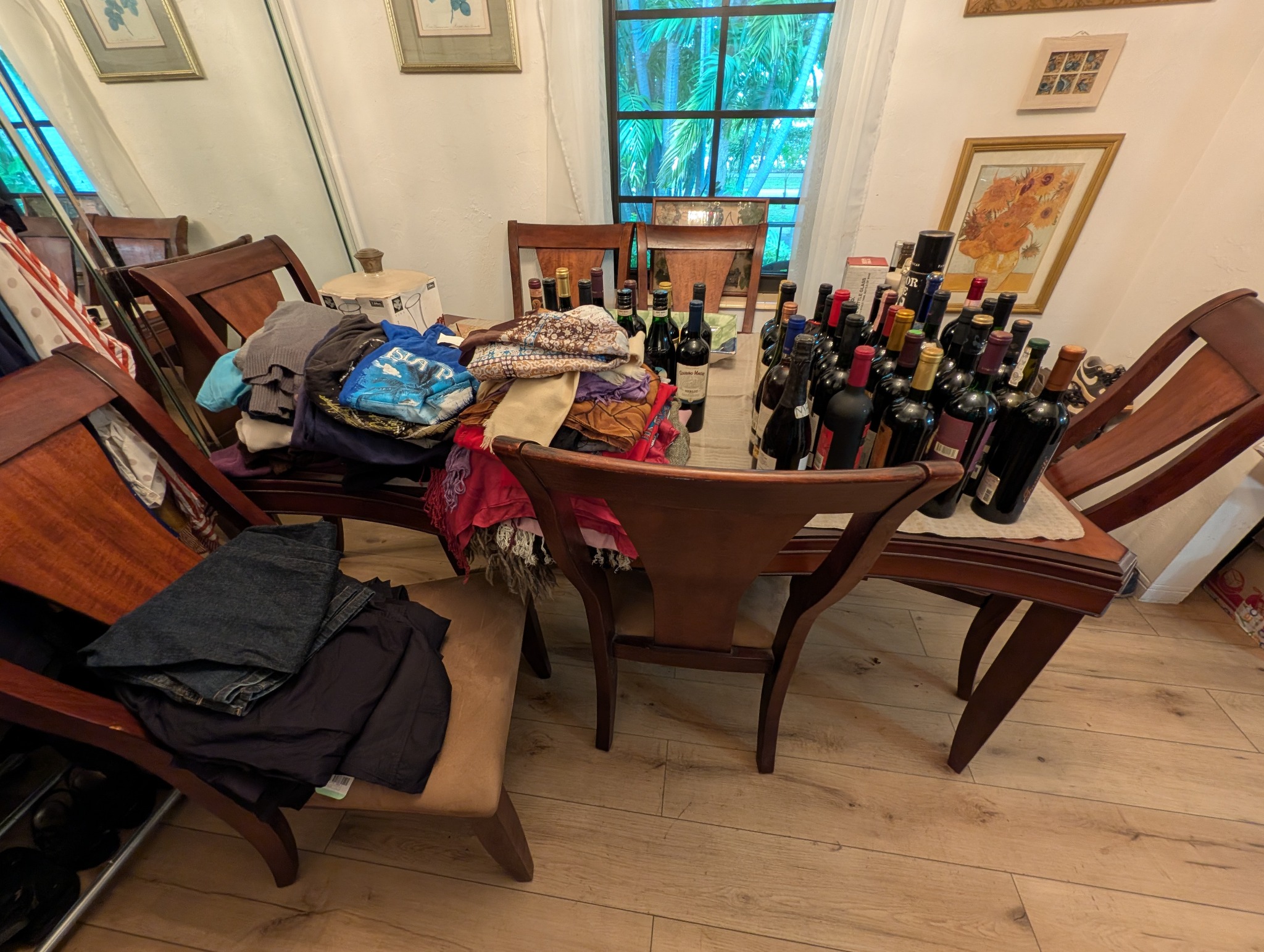 Dining table displaying textiles and bottles